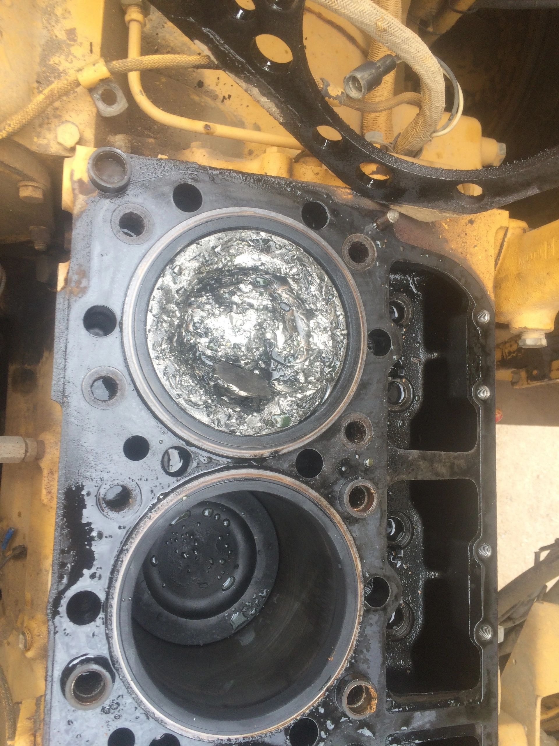 Engine cylinder head disassembled for repair